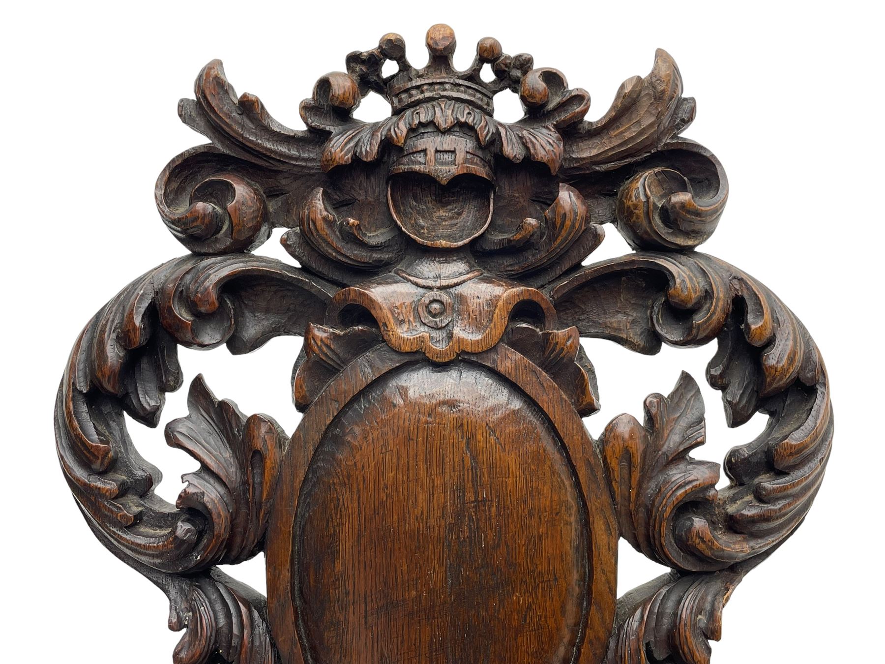 19th century oak hall chair, shaped and pierced back carved with crown cresting over curled and scrolled acanthus leaves, tapered rectangular seat with foliate carved corners and fluted chamfered edge, on turned and lobe carved splayed supports 