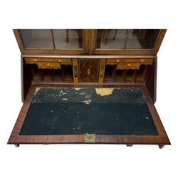 Early 19th century mahogany bureau bookcase, the projecting cornice over two Gothic-style astragal glazed doors enclosing two adjustable shelves, sloped hinged lid enclosing fitted interior and felt inset, four graduating drawers, on bracket feet