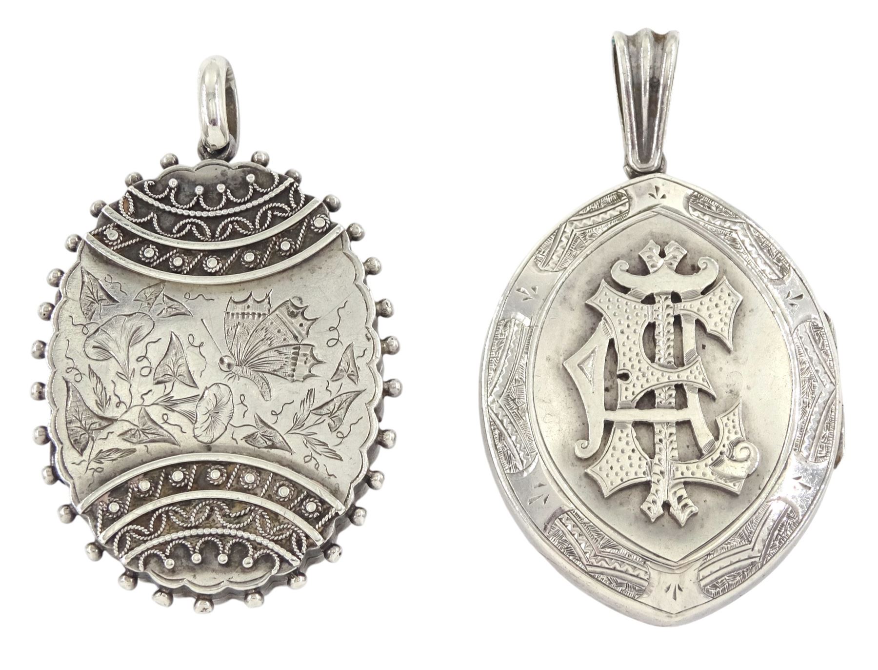 19th / early 20th century silver hinged locket, with applied wirework and engraved butterfly and foliate decoration and one other silver locket, with monogrammed decoration