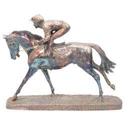 Silver model of a racehorse with jockey up, filled, on a naturalistic rectangular base 21cm x 26cm Sheffield 1996 Maker Camelot Silverware Ltd 