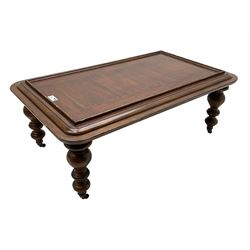 Milling Road - cherry wood coffee table, rectangular top with rounded corners, on turned feet with castors