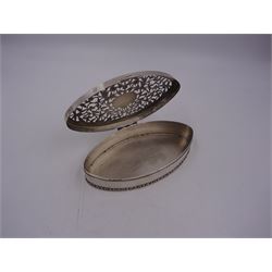 Edwardian silver trinket box, of navette form, the hinged cover with pierced floral and foliate decoration, and blank cartouche, hallmarked George Nathan & Ridley Hayes, Birmingham 1915 and stamped to base Pearce & Sons Silversmiths Leeds & York, W15.5cm, H3.5cm, 