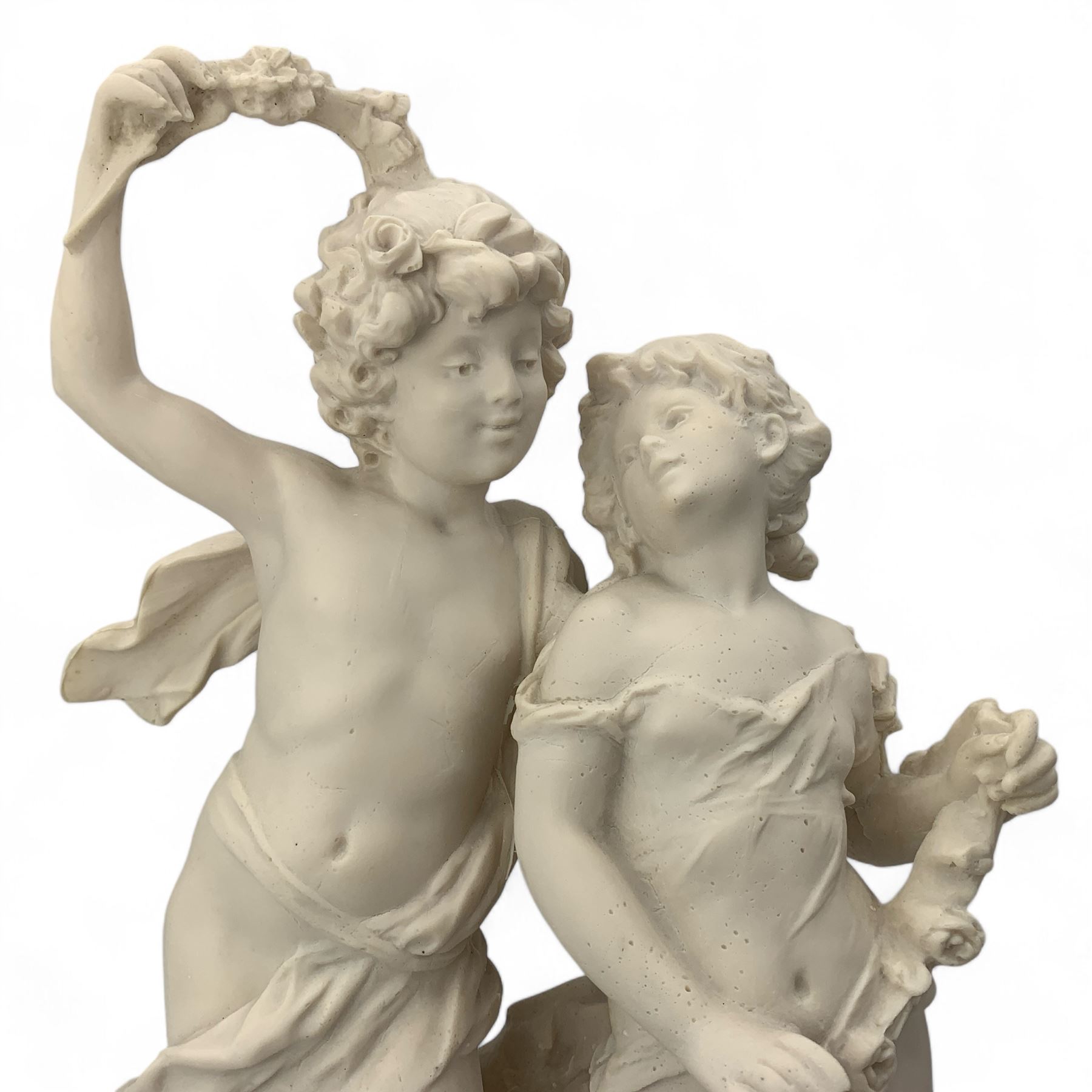 After Auguste Moreau, 20th century faux alabaster figural group 'La Fete Des Fleurs', on circular ebonised plinth, H57cm