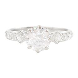 Platinum single stone old cut diamond ring, with diamond set shoulders, principal diamond ...