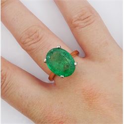 18ct rose gold and platinum single stone oval cut emerald ring, hallmarked, emerald approx 6.60 carat