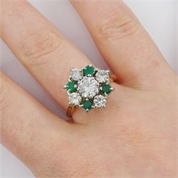 18ct gold emerald and diamond cluster ring, the central round brilliant cut diamond of approx 0.80 carat, with four stone round cut emerald and four stone round brilliant cut diamond surround, Sheffield 1977, total diamond weight approx 1.70 carat