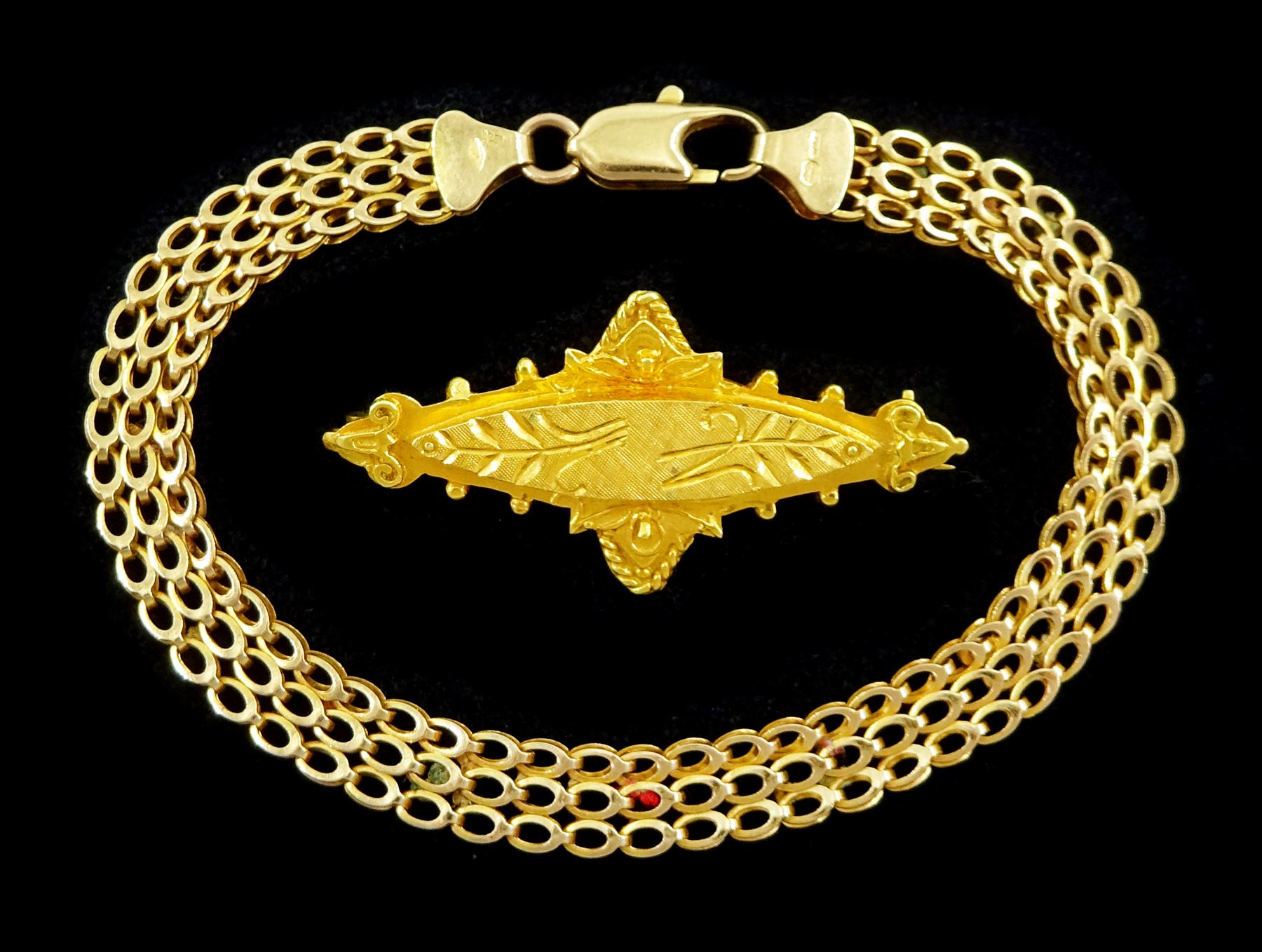 9ct gold fancy link bracelet, hallmarked and an 18ct gold brooch