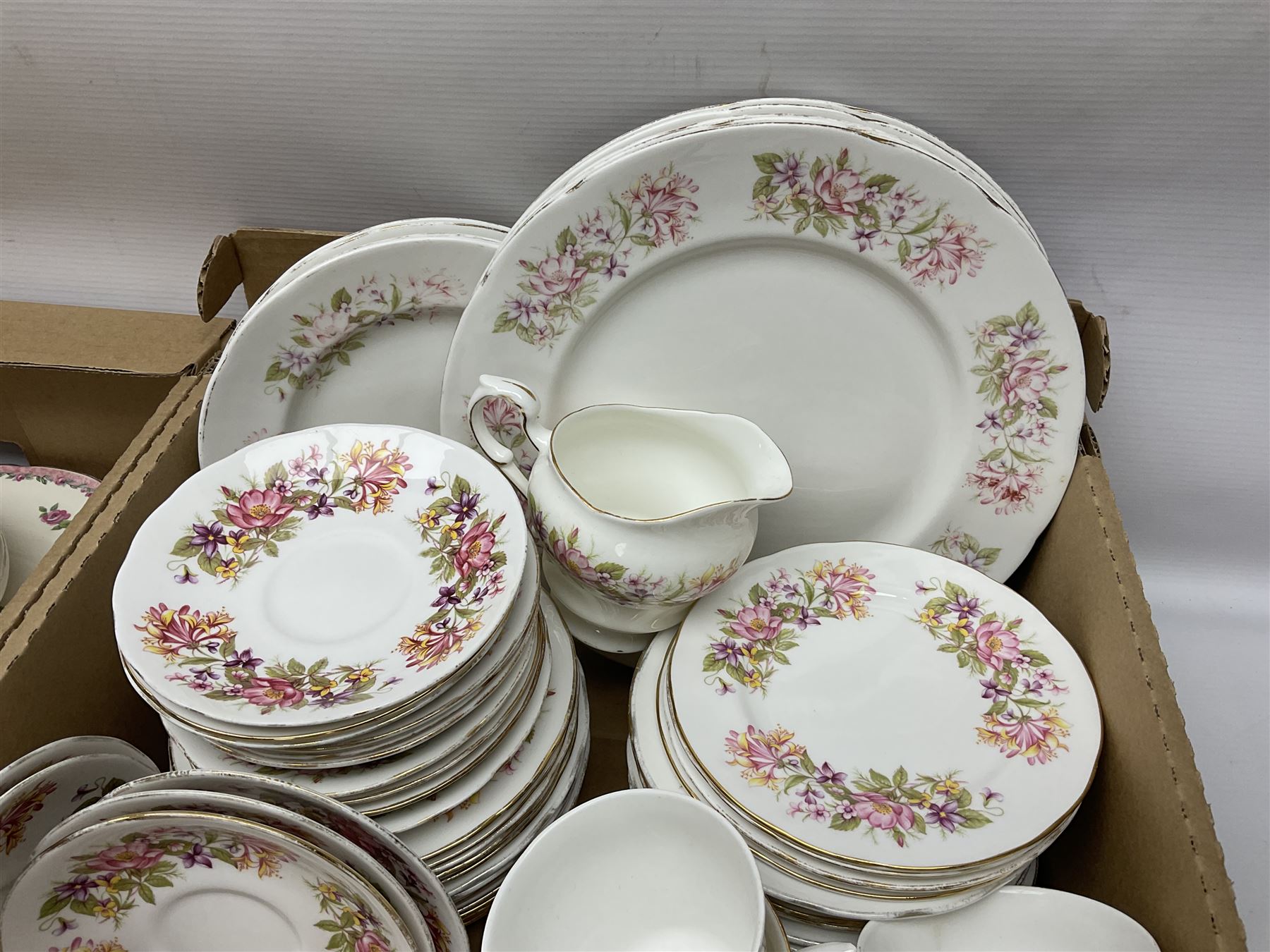 Royal Staffordshire Dinnerware by Clarice Cliff Nancy pattern dinner wares, including sauce boat, dinner plates, side plate and serving platter, together with a collection of Colclough Wayside Honeysuckle pattern tea wares