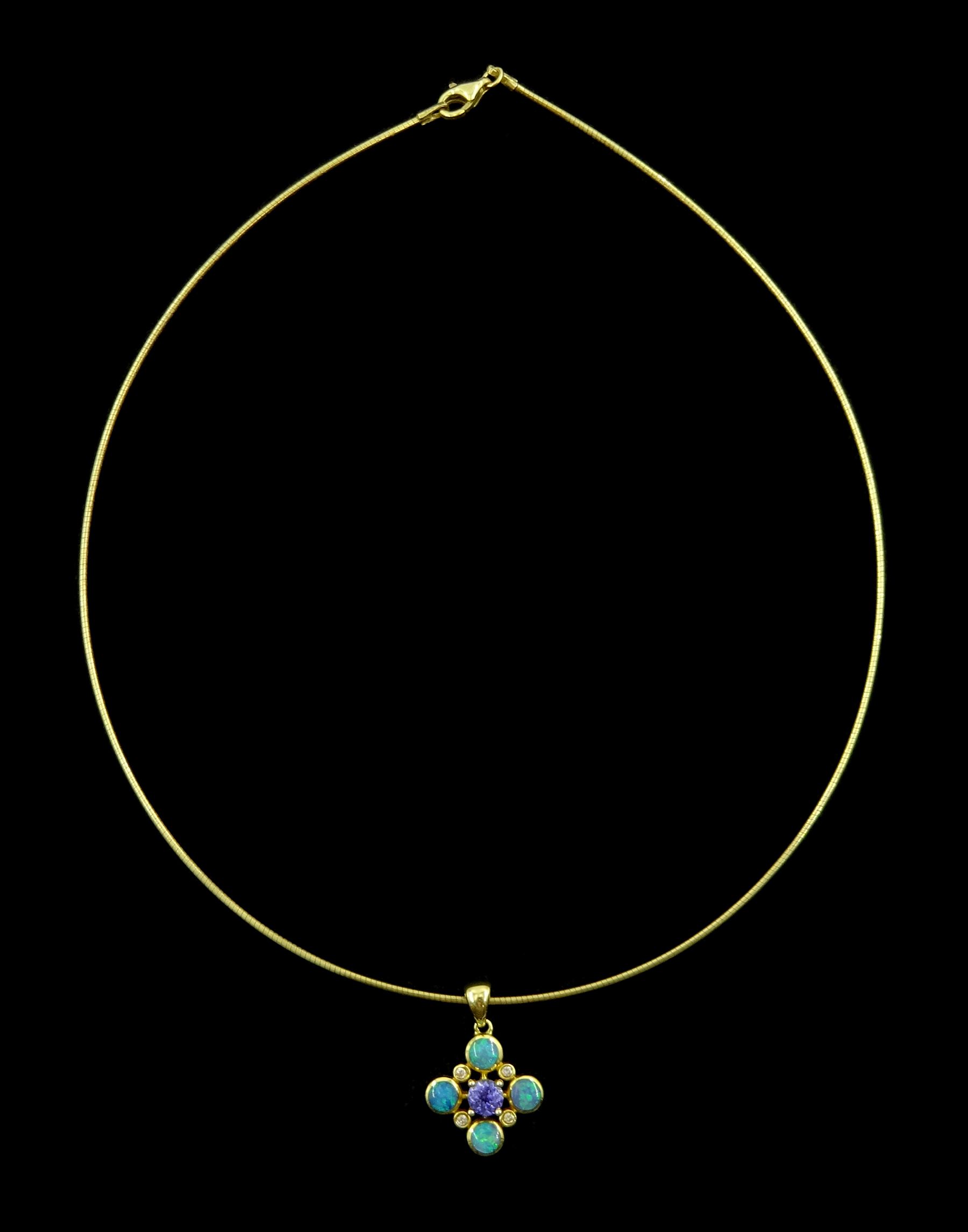 14ct gold opal, tanzanite and diamond pendant, stamped 585, on 9ct gold Omega link chain necklace, hallmarked