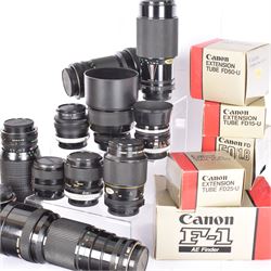 Canon F-1 SLR camera body serial no. 300461, boxed, together with thirteen Canon camera lenses, mostly FD, including 300mm 1:4 serial no. 18864, 100-300mm 1:5.6 serial no. 24187 and 200mm 1:2.8 serial no 16443, and three boxed FD extension tubes, some boxed