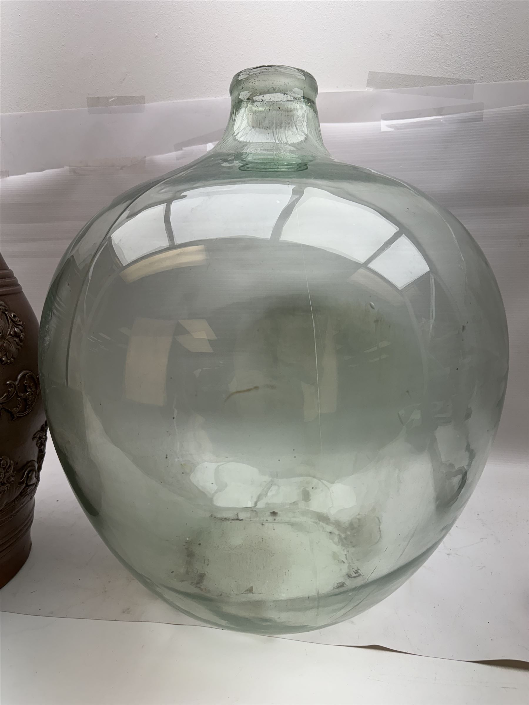 Salt glazed stoneware barrel together with a glass carboy, carboy H54cm  