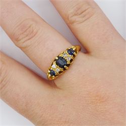 Early 20th century 18ct gold three stone sapphire and four stone old cut diamond ring