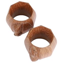 Mouseman - two oak napkin rings, bulbous octagonal form carved with mouse signature, by the workshop of Robert Thompson, Kilburn