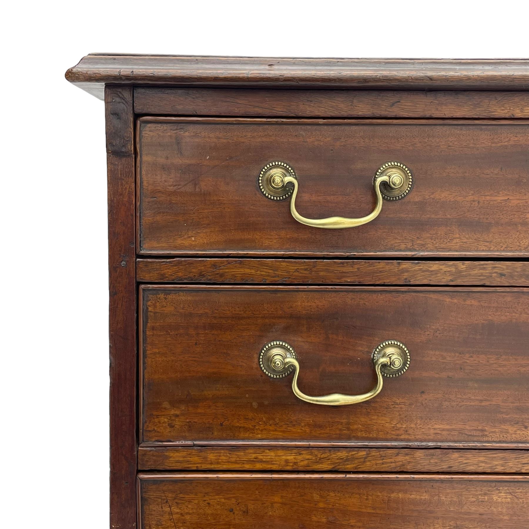 George III mahogany chest, moulded rectangular top over four long graduating cock-beaded drawers, fitted with brass swan neck handles, on bracket feet