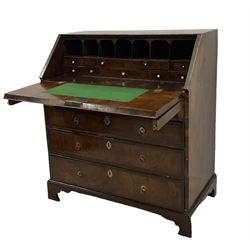 18th century walnut bureau, crossbanded and feather-banded rectangular top and fall-front, enclosing fitted interior with pigeonholes and correspondence drawers with bone handles, over two short and three long graduating drawers with moulded facias and original brass handles, on bracket feet