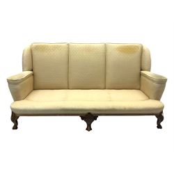 Late 20th century mahogany framed three seat sofa, upholstered in cream fabric with repeating cross pattern, raised on cabriole supports (W192cm, D98cm, H89cm); matching armchair in light pink fabric (W92cm, D98cm, H89cm) 