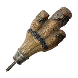 Late 19th/early 20th century Black Forest style carved walking stick handle, modelled as three owls with glass eyes, H9cm