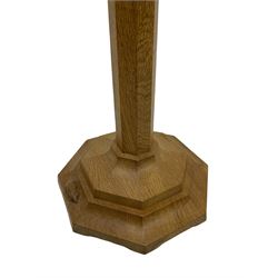 Mouseman - oak standard lamp, octagonal tapered stem on stepped and moulded octagonal base, carved with mouse signature, by the workshop of Robert Thompson, Kilburm 