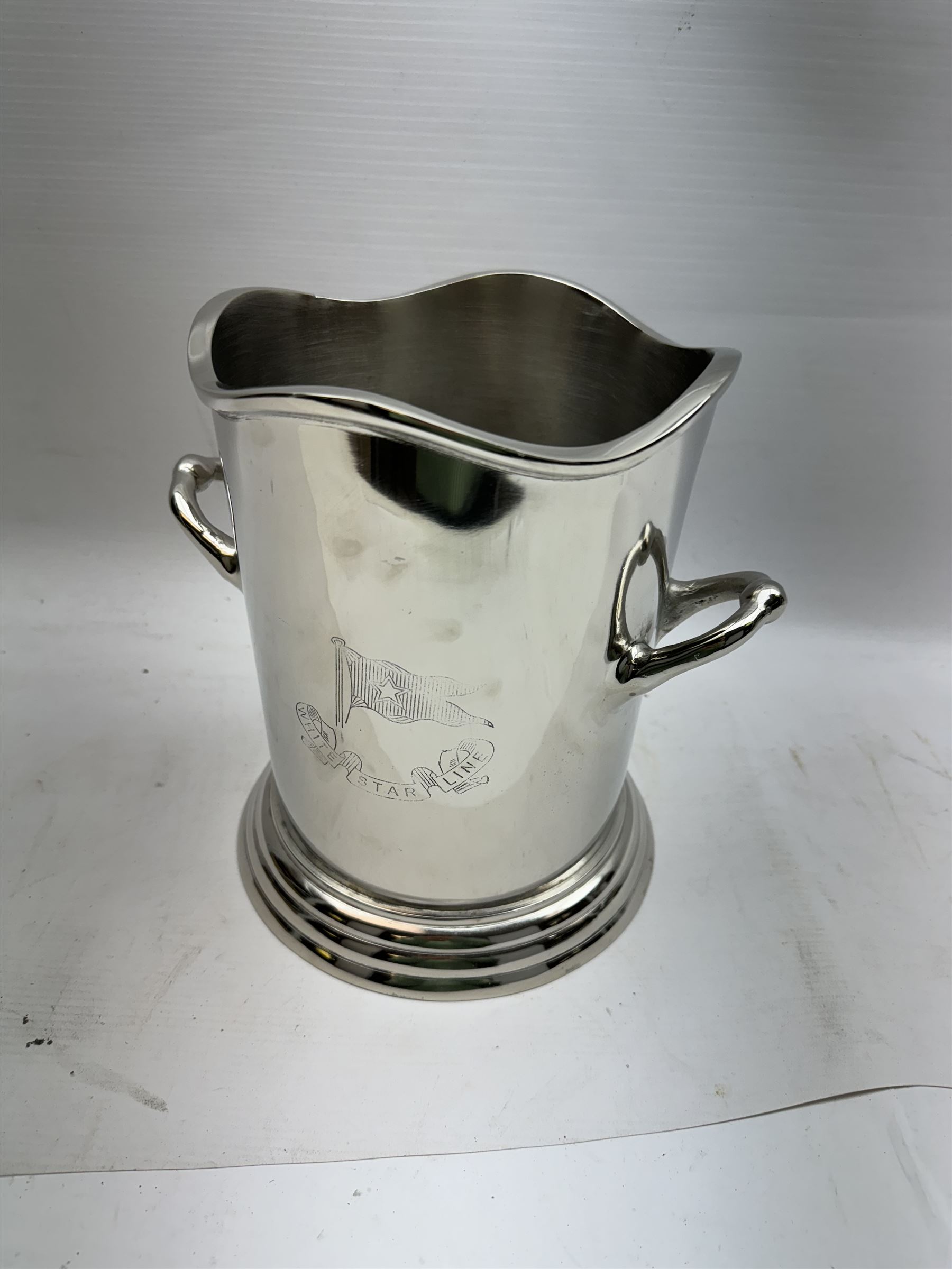 Polished modern aluminium champagne bucket inscribed White Star Line, H24cm