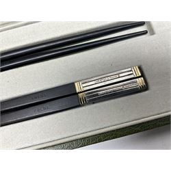 Set of eight silver plated ebony chopsticks by Christofle France, in presentation case