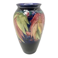 Moorcroft vase of baluster from, decorated with Leaf and Berry pattern, with impressed and painted marks beneath, H19cm
