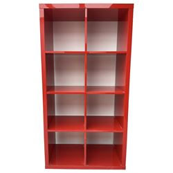 Modern red lacquered bookcase or shelving unit, with eight evenly divided compartments, finished in a high-gloss lacquer