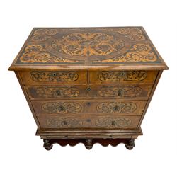 18th century inlaid walnut chest on stand, ovolo-moulded rectangular top inlaid with ebony panels each decorated with scrolling foliage, flower heads and birds, fitted with two short over three long drawers, the drawer fronts decorated with ebony panels enclosing curled leaf inlays, the base fitted with single drawer on turned supports united by waved stretchers, on turned bun feet 