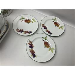 Royal Worcester Evesham pattern, including covered pot de cremes, twin handle tureen, serving dishes, flan dishes, side plates etc  