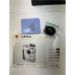 Leica C11 APS film compact camera, in silver and chrome finish, serial no. 2636834, in original clear hard case and box, with instruction booklet, together with a Leica Digilux 4.3, with 1:2.8-4.5/8.3-24.9mm lens, serial no. 2598862, with instruction booklet