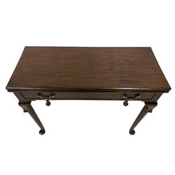 George III mahogany card table, moulded rectangular fold-over top revealing baize lined interior, single cocked-beaded frieze drawer with brass swan neck handles, on lappet carved cabriole supports, double gate-leg action base 