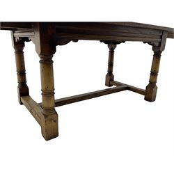 Oak refectory dining table, rectangular three plank top with cleated ends, two additional leaves, on turned supports united by H-stretchers 