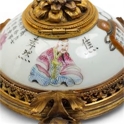 19th century Chinese porcelain famille rose inkwell, painted with figures from the Wu Shuang Pu to include Jiao Xiao Ran and Li Bai, mounted with ormolu style gilt metal mounts, including a floral hinged cover, pierced gallery base, on three rose stem supports, L13cm x H9cm