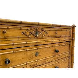 Victorian pine and simulated bamboo chest, fitted with five drawers, the drawer fronts decorated with applied simulated bamboo mounts and turned ebonised handles, on turned front feet