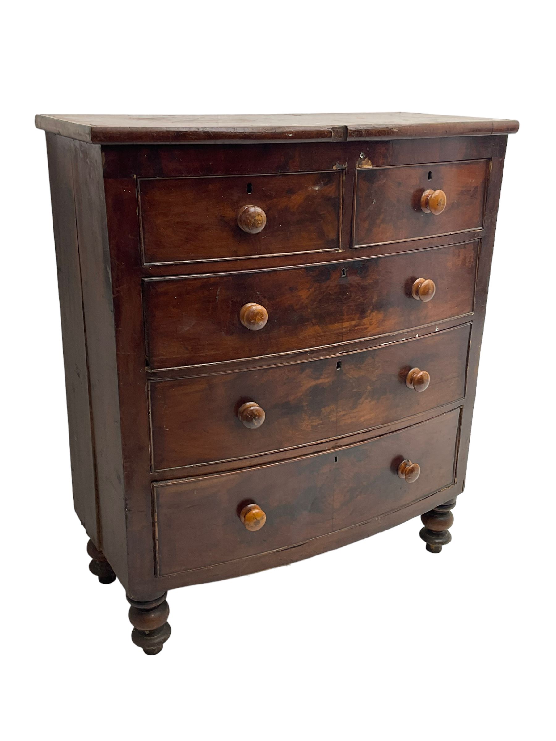 Victorian mahogany bow-front chest, fitted with two short and three long drawers, on turned feet