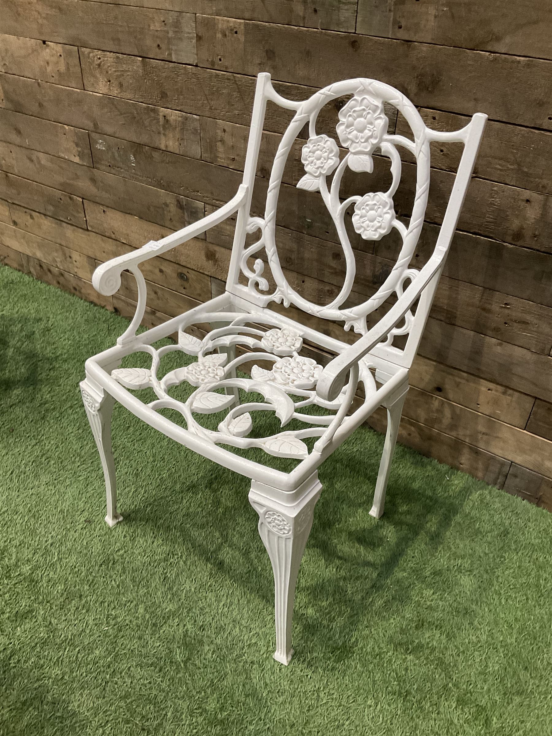 Cast aluminium circular garden table and three chairs - THIS LOT IS TO BE COLLECTED BY APPOINTMENT FROM DUGGLEBY STORAGE, GREAT HILL, EASTFIELD, SCARBOROUGH, YO11 3TX