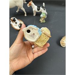 Two Royal Doulton figures of puppies in baskets, together with Beswick horse and other animal figures