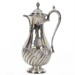 Victorian silver hot water pot, of part fluted form engraved with initials to body, the li...