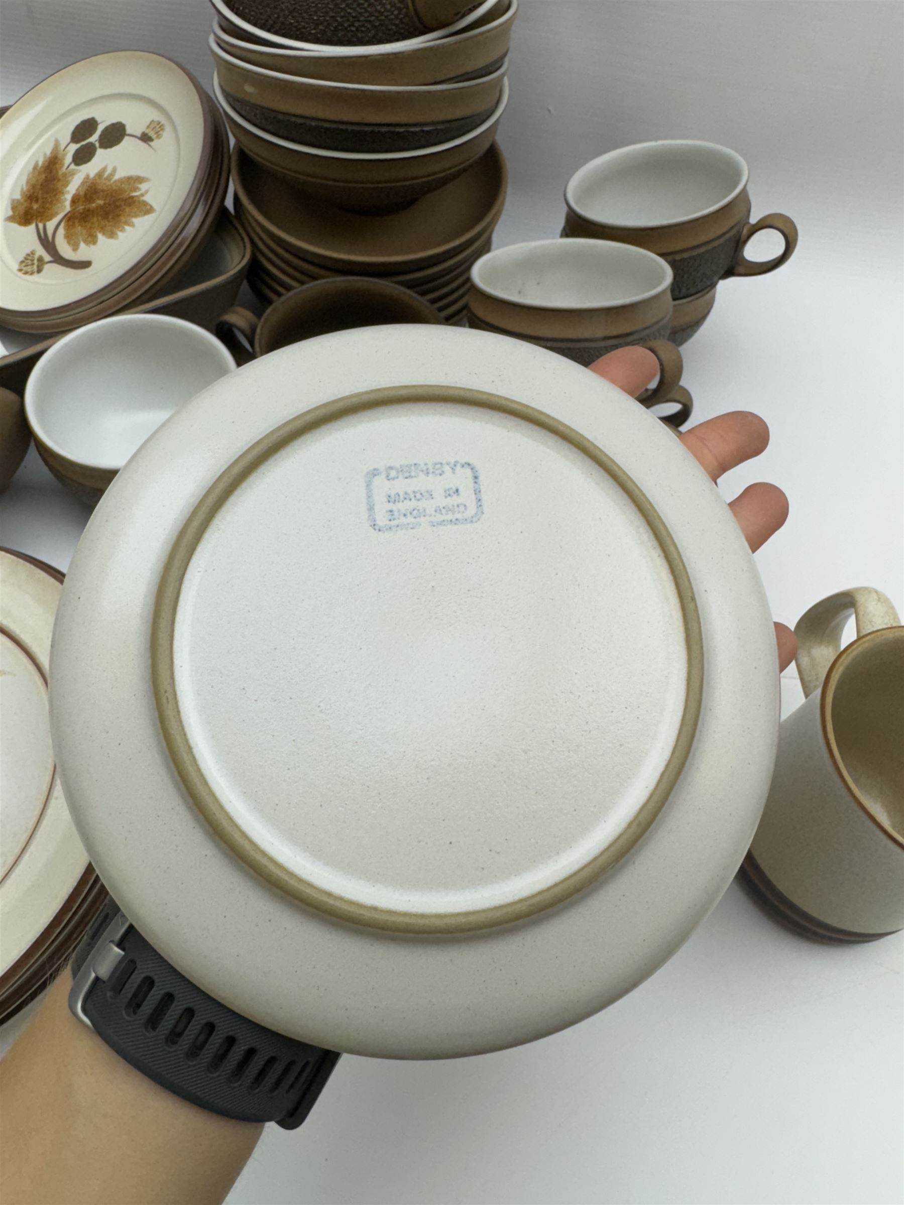 Denby Cotswold pattern, part tea and dinner service, including eight dinner plates, eight tea cups and saucers, serving dishes etc  