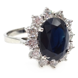  White gold sapphire and diamond cluster ring, hallmarked 18ct, sapphire 4.8 carat, diamonds 1.06 carat  