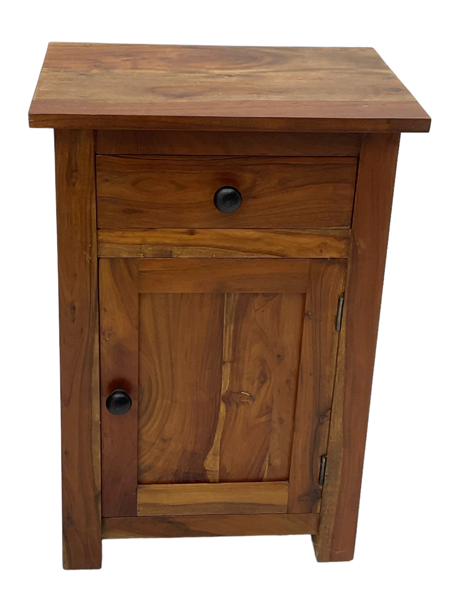 Pair of hardwood bedside cabinets, fitted with single drawer over panelled cupboard 