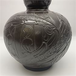 Burmantoft vase with slender neck, tubeline decoration on a brown ground, with impressed mark beneath, H38cm