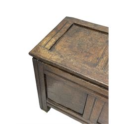 17th century panelled oak blanket chest or kist, quadruple panelled hinged lid over quadruple panelled front, moulded frame and pegged construction, on stile supports