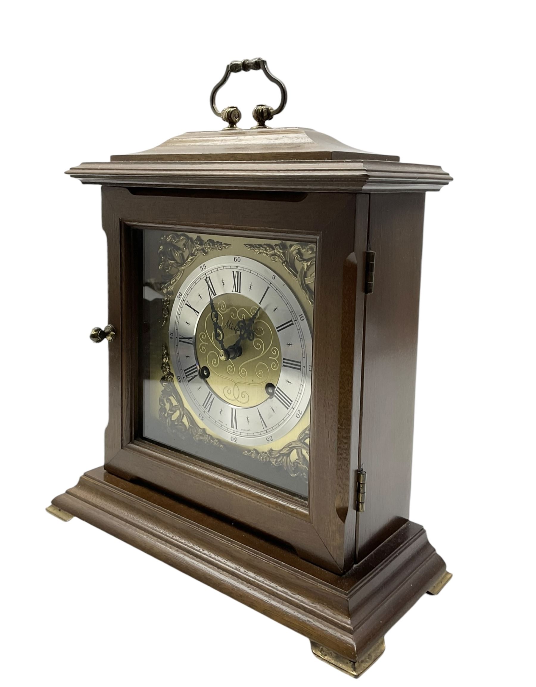 20th oak cased mantle clock, German spring driven movement striking the hours on three gong rods.