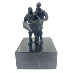 20th century bronze sculpture, modelled as two figures reading, upon a black and white marble base, H14cm