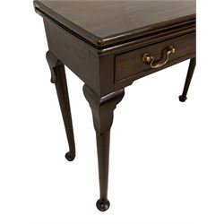 George III mahogany card table, moulded rectangular fold-over top revealing baize lined interior, single cocked-beaded frieze drawer with brass swan neck handles, on lappet carved cabriole supports, double gate-leg action base 