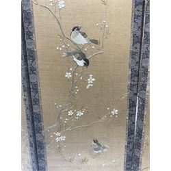 Two Oriental silk and wooden screens embroidered with birds and blossoming branches, largest H88cm 