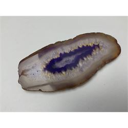 Three purple agate slices, polished with rough edges, of various sizes largest H7cm, L10cm