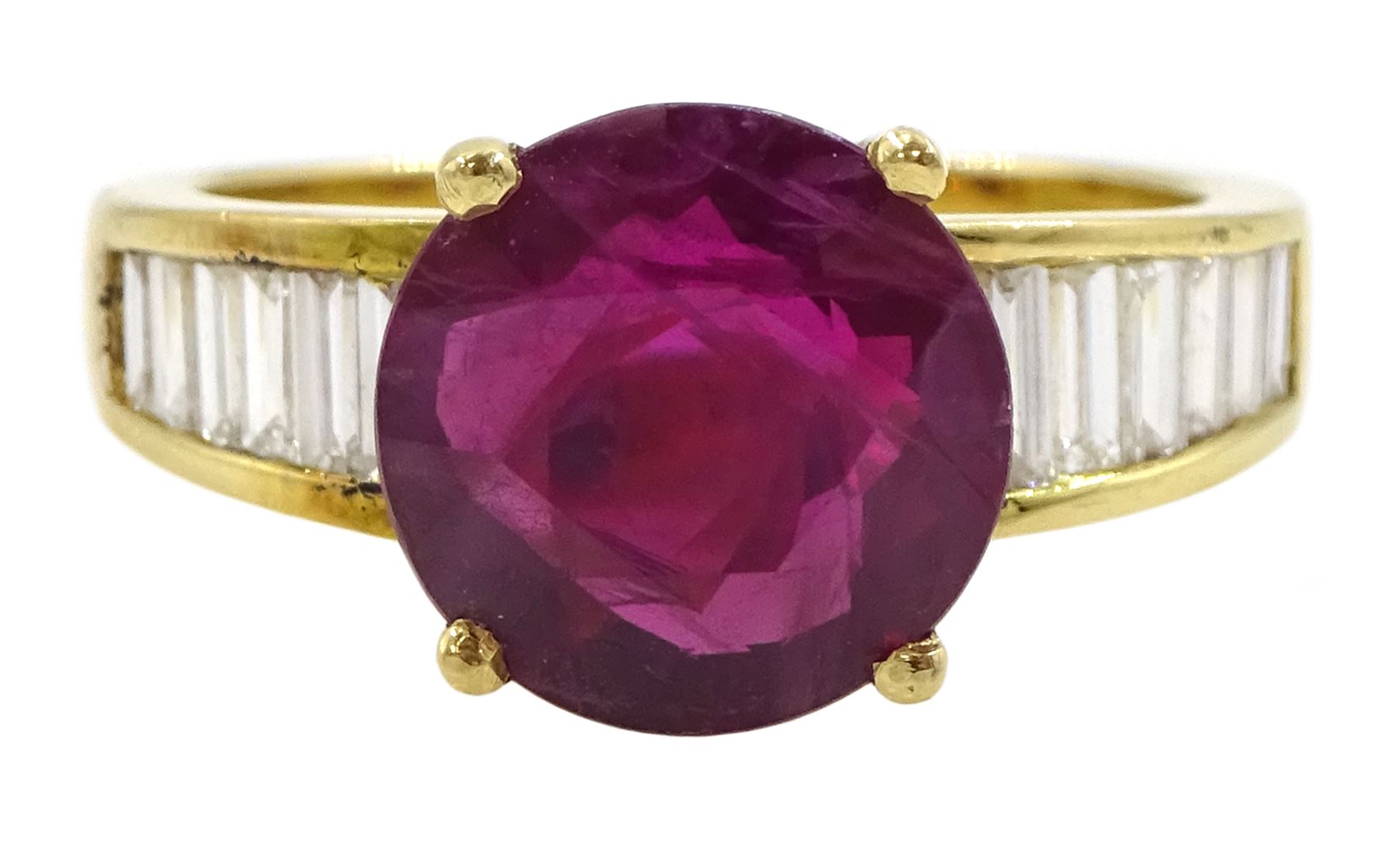 18ct gold single stone ruby ring, with channel set baguette cut diamond shoulders, ruby approx 3.25 carat, total diamond weight approx 0.85 carat