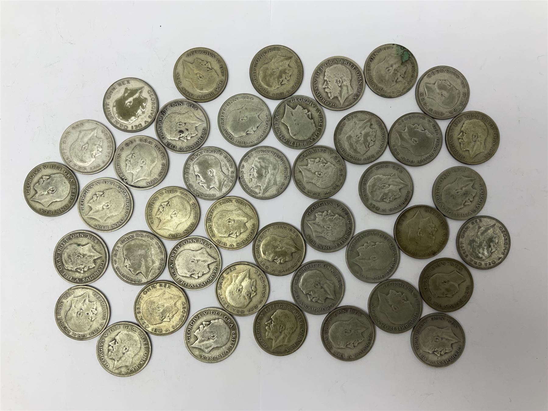 Approximately 580 grams of Great British pre 1947 silver half crown coins