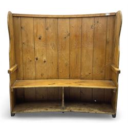 19th century pine barrel back settle, bowed boarded back on shaped end supports, with upho...